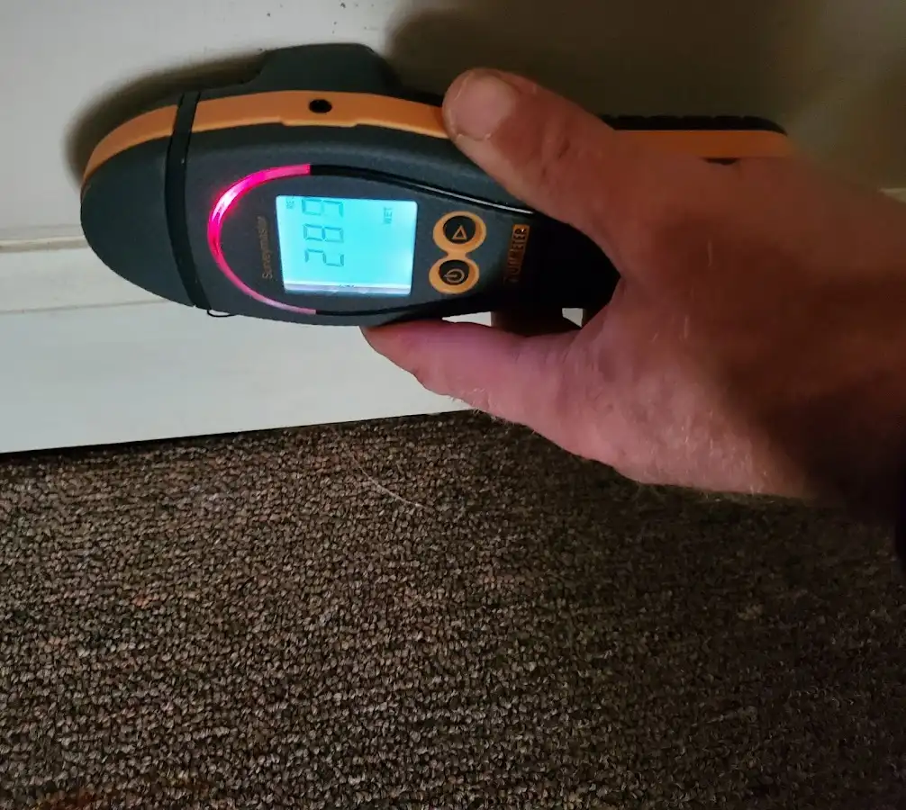 Moisture detection at baseboard during Storm Damage Restoration in Plymouth